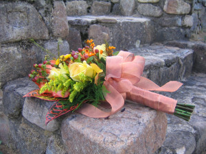 Wedding bouquet sitting on old stone steps